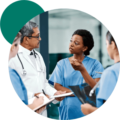 Clinicians discussing a handoff